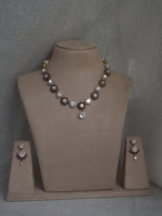 aarika polki floral necklace set with ruby and emerald accents by lylak