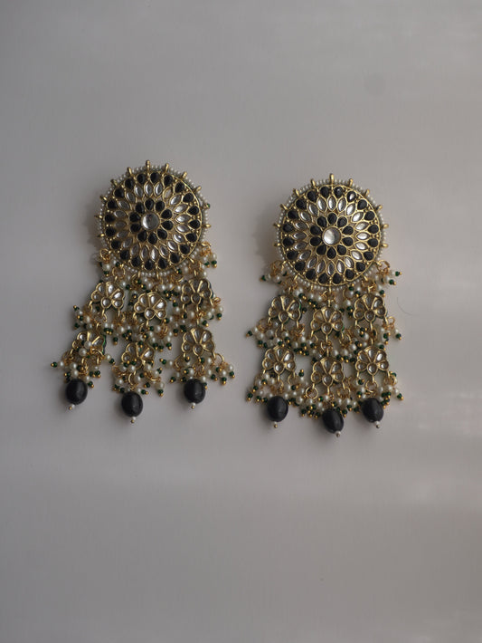 Zareen Black Kundan Floral Tassel Earrings