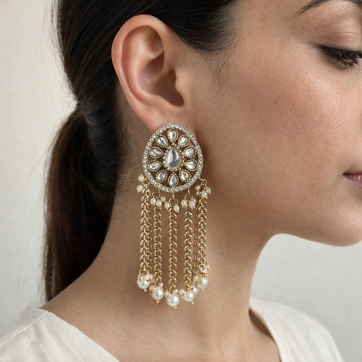 White Aarini Kundan Pearl Tassel Earrings