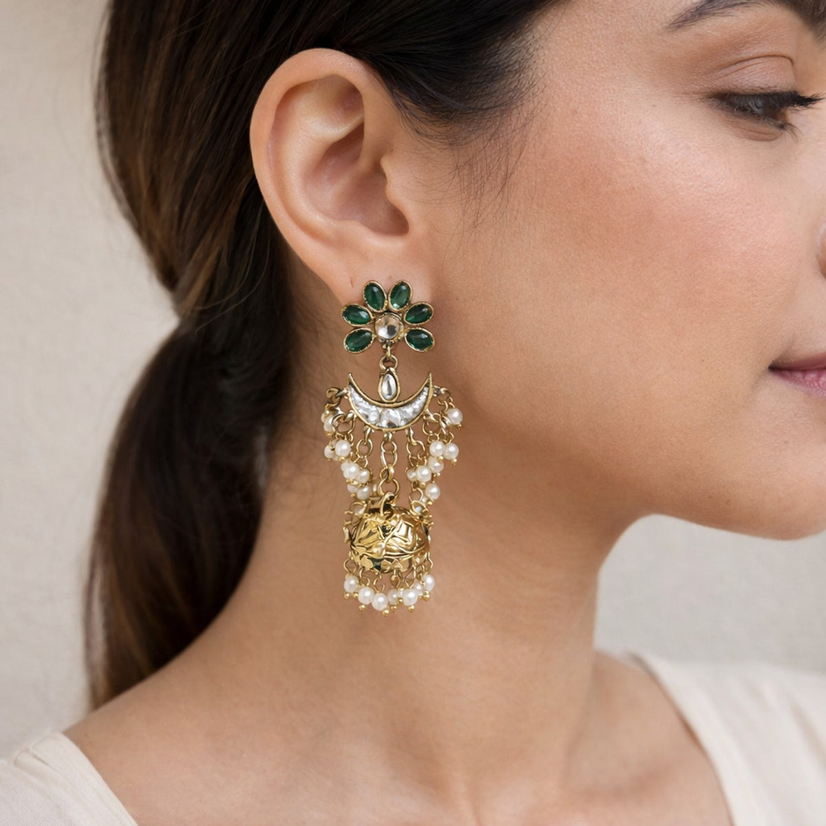Emerald Saheli Kundan Jhumka Earrings