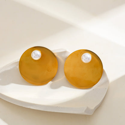 Pearl Disc Statement Studs