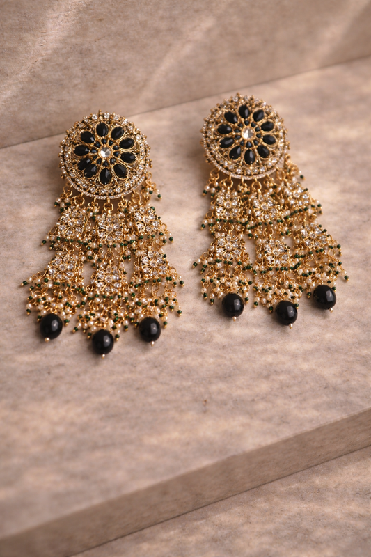 Zareen Black Kundan Floral Tassel Earrings