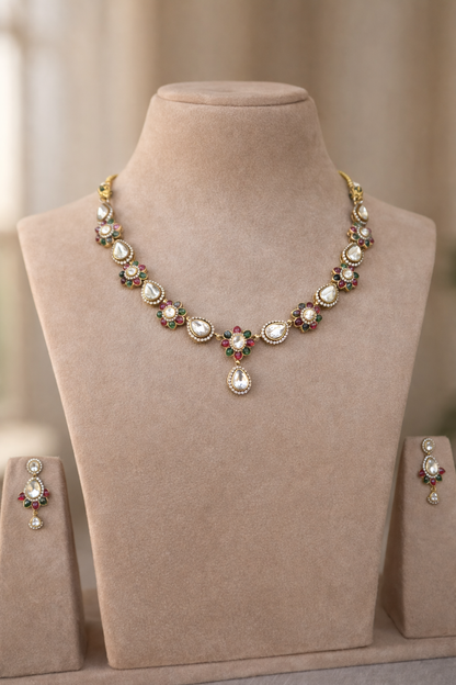 aarika polki floral necklace set with ruby and emerald accents by lylak