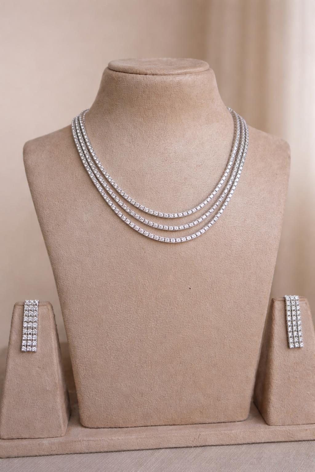celestia triple row diamond necklace set with matching earrings by lylak